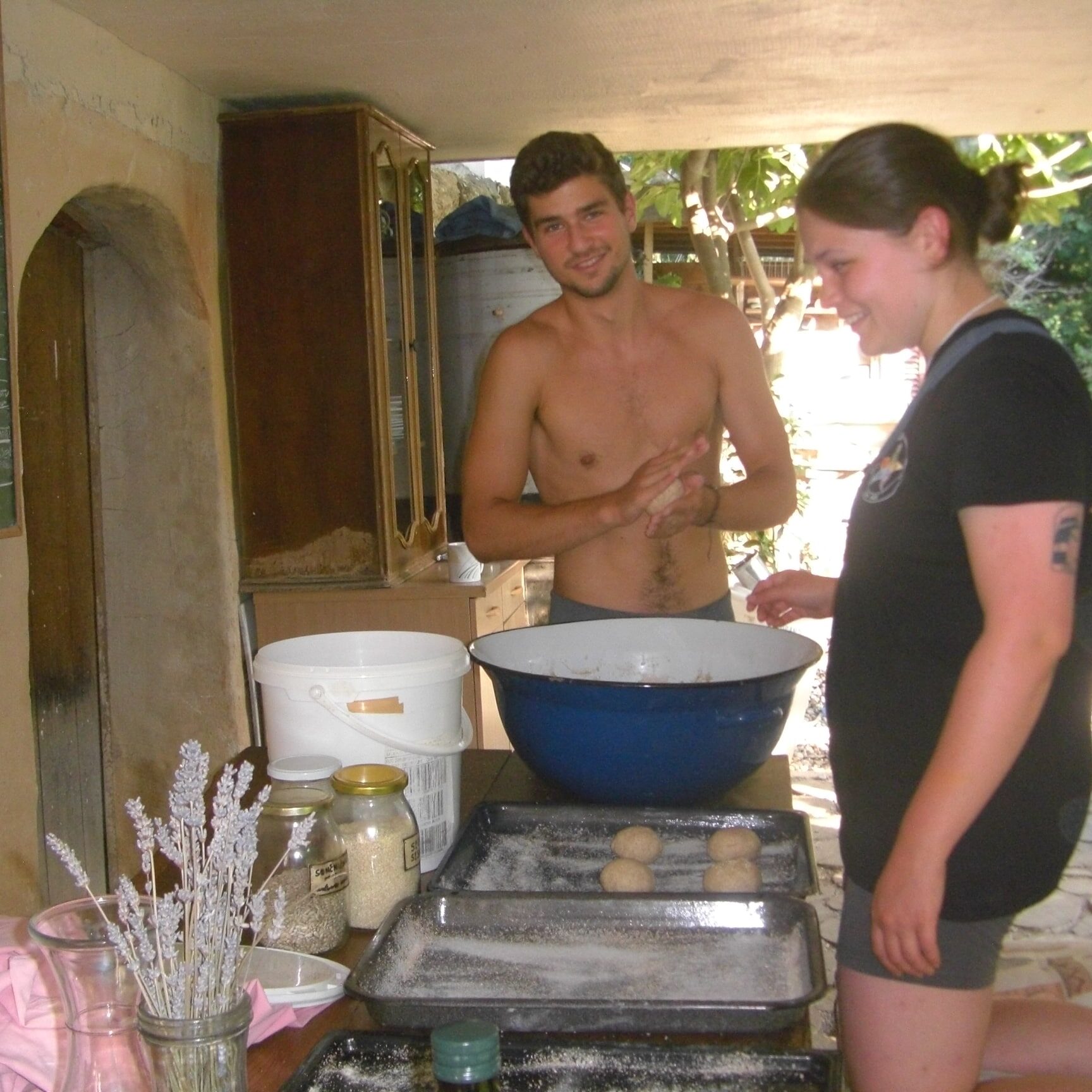 Volunteers preparing bread buns