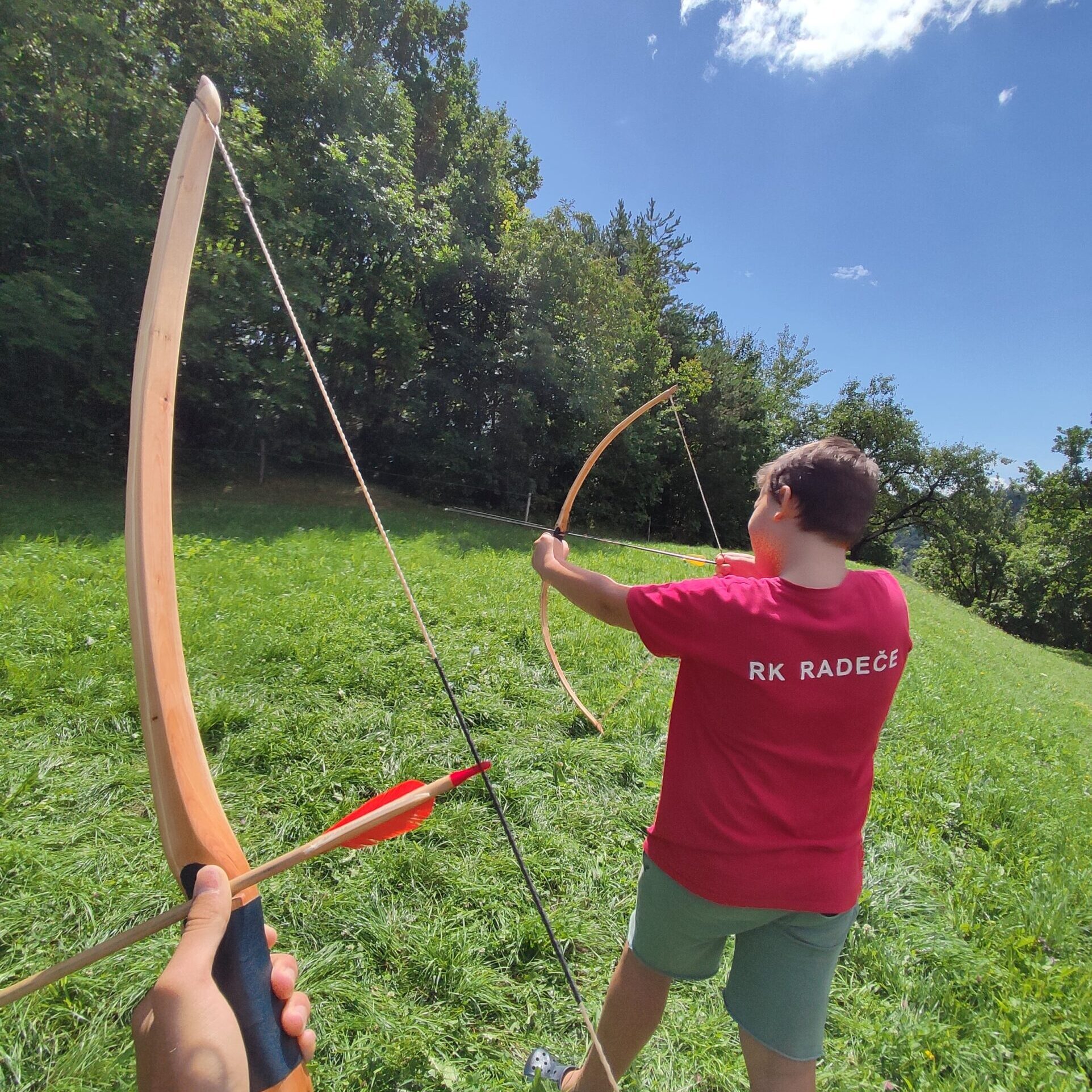 Practicing our archery with the kids